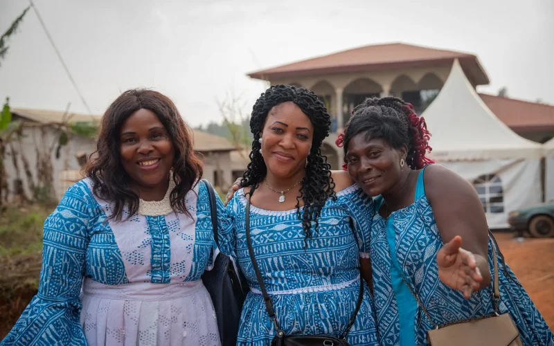 Three mature african women smiling together